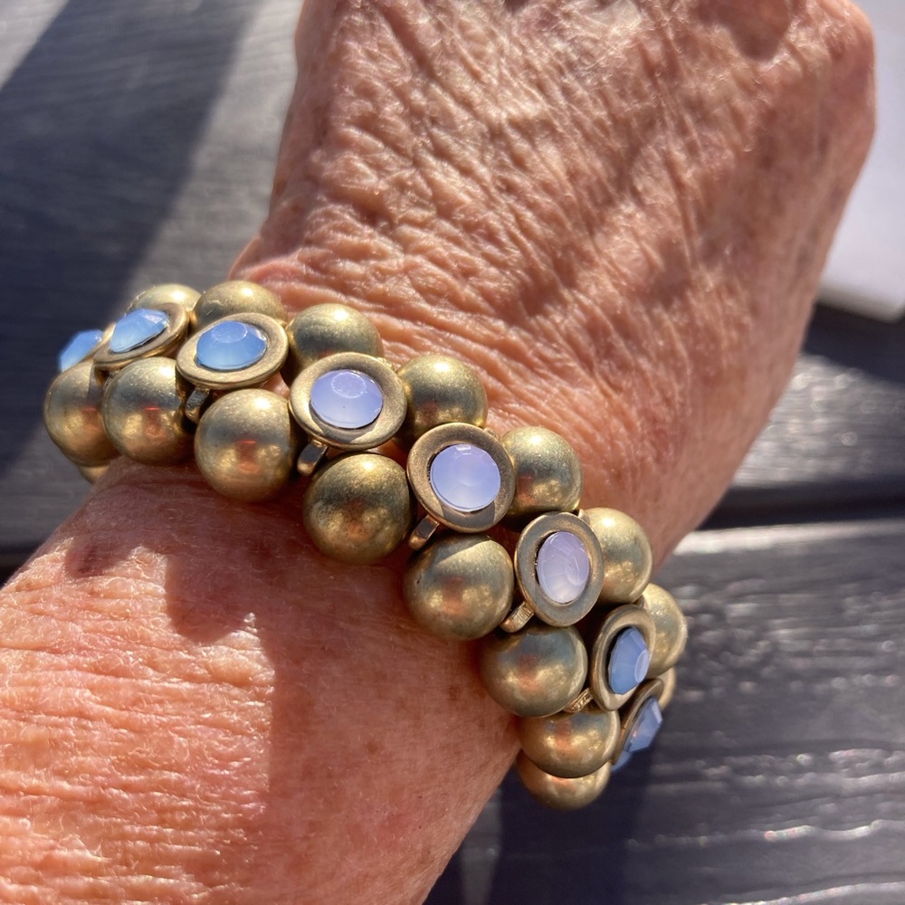 Bracelet goldtone beads moonstone center adjustable band OS